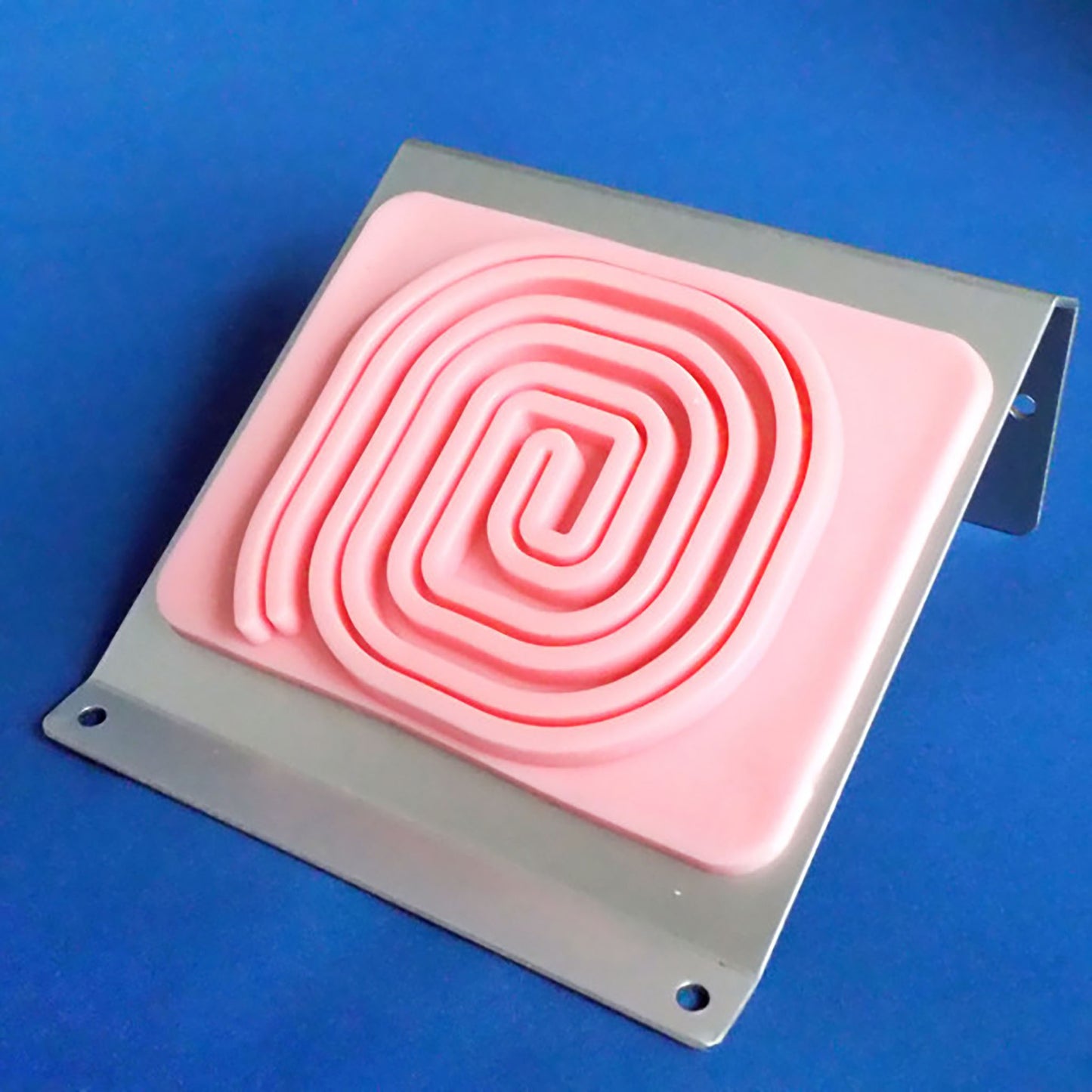 The Soft Training Pad Swirl propped up on a metal base.