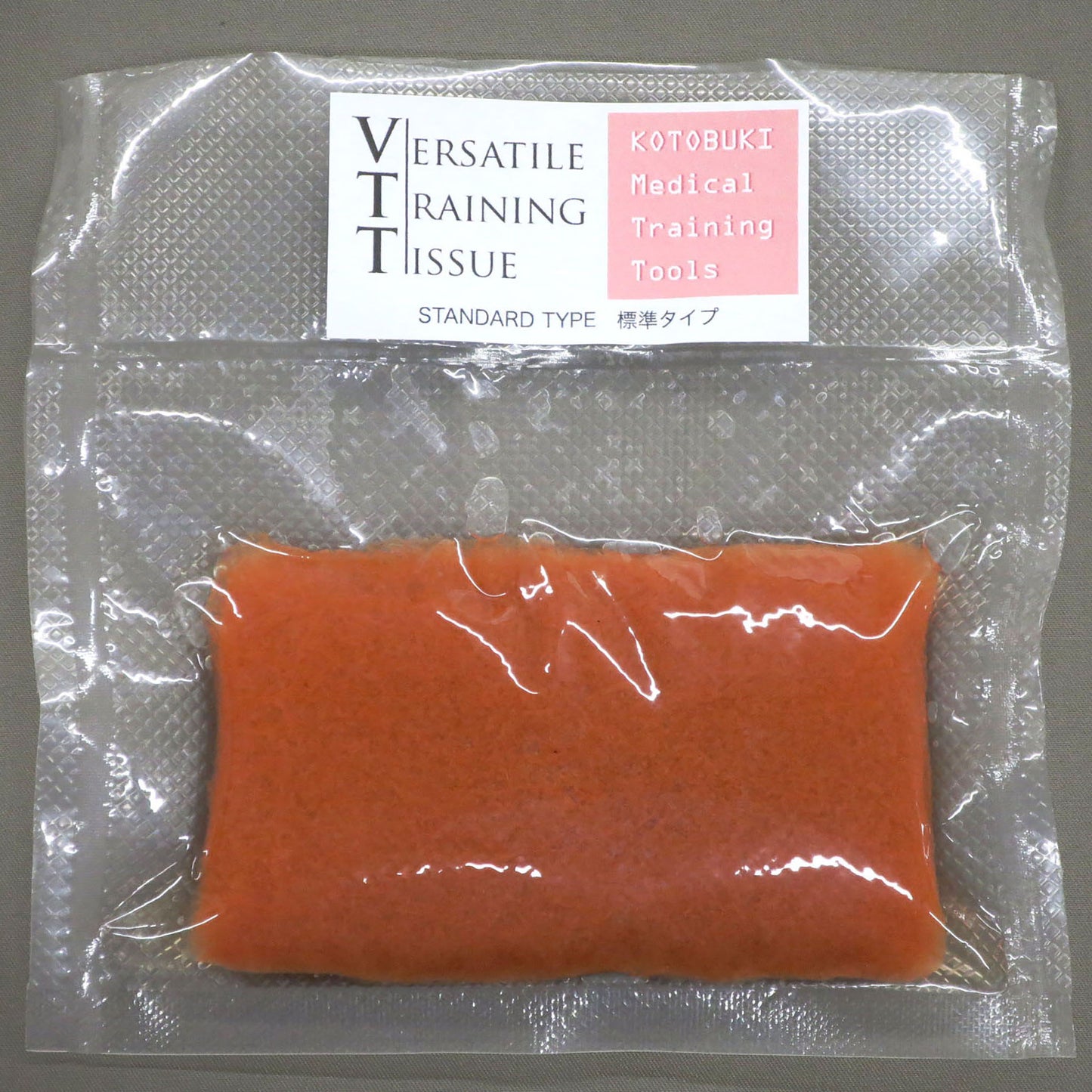 The VTT Standard Type in its shrink-wrapped packaging against a gray background. 