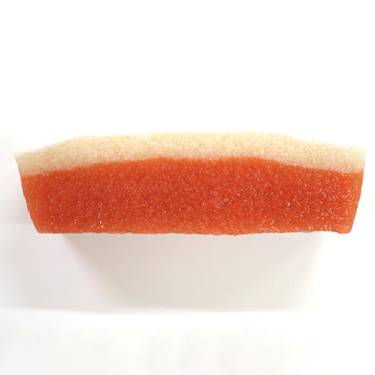 Side view of the Double Layer Type. The red base layer is spongey and slightly moist. The thinner muscular layer is white and dense. Both are made of the same plant-based tissue.